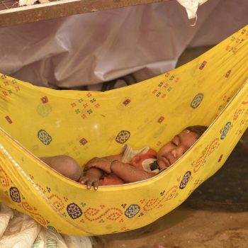 india, land of colors-sleeping baby in pushkar
